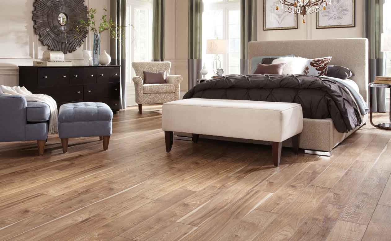 Wood look tile panel floor in master bedroom 